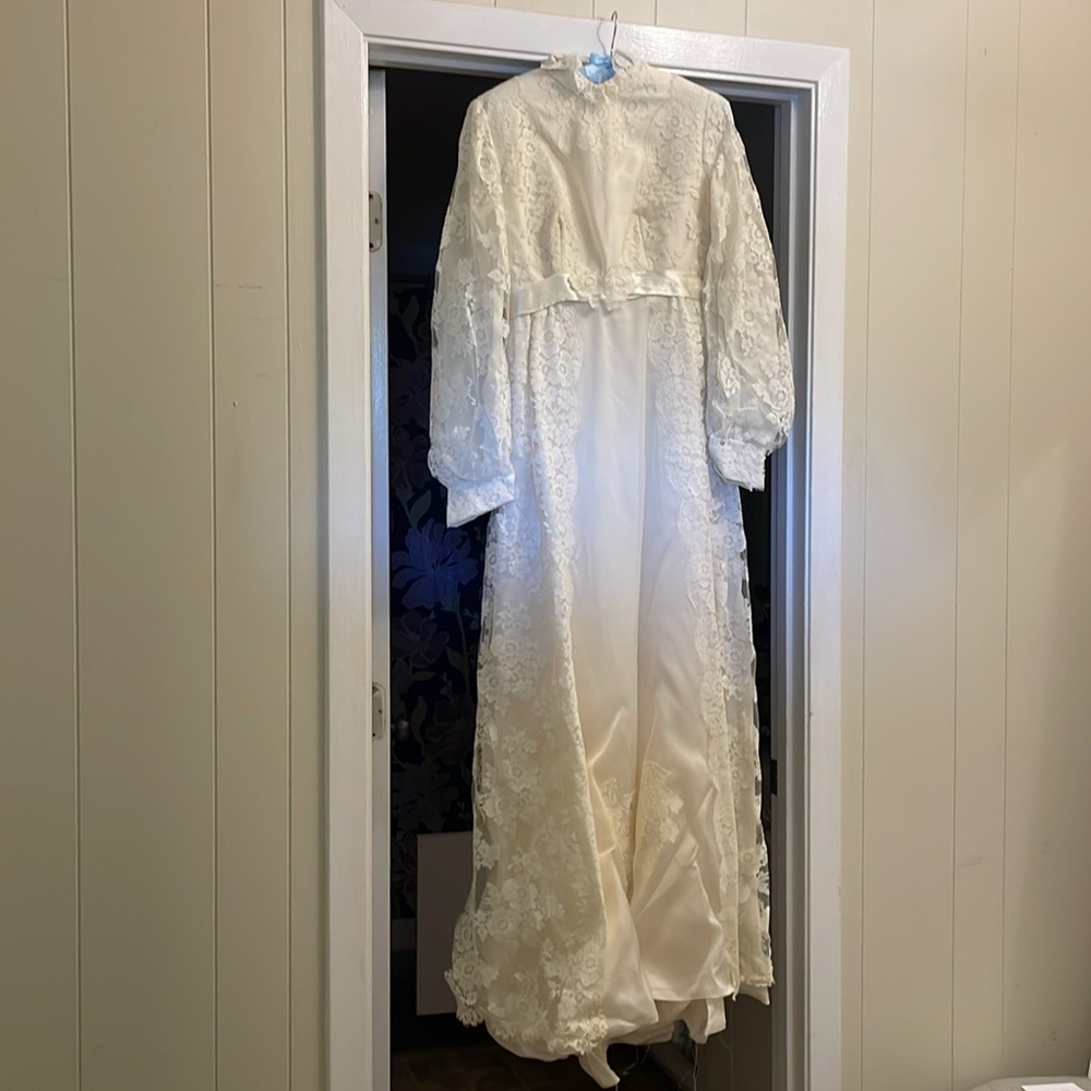 Vintage bridal long sleeve lace wedding dress with bow detail